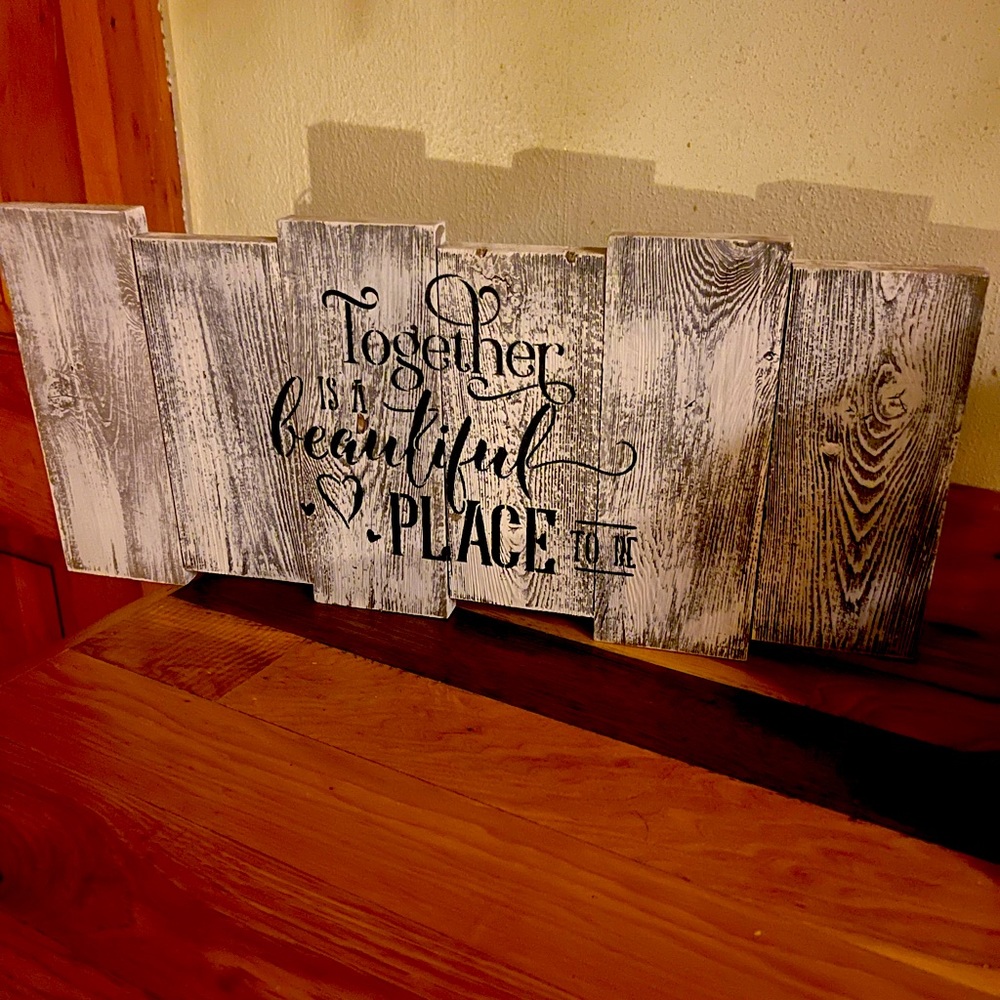 Rustic handmade wooden sign .